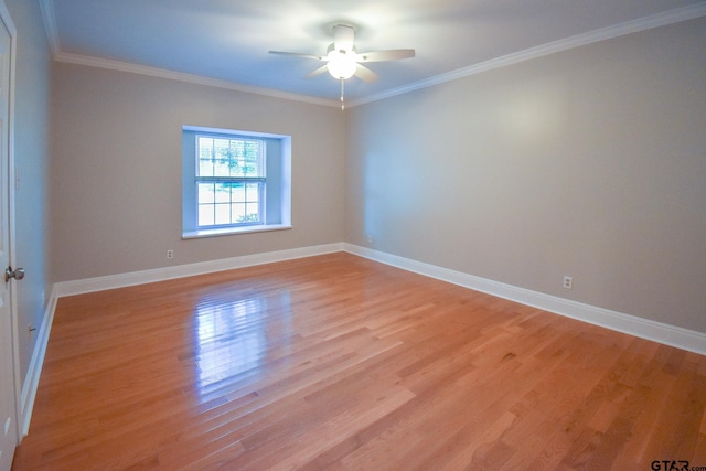 unfurnished room with light hardwood / wood-style flooring, ceiling fan, and crown molding