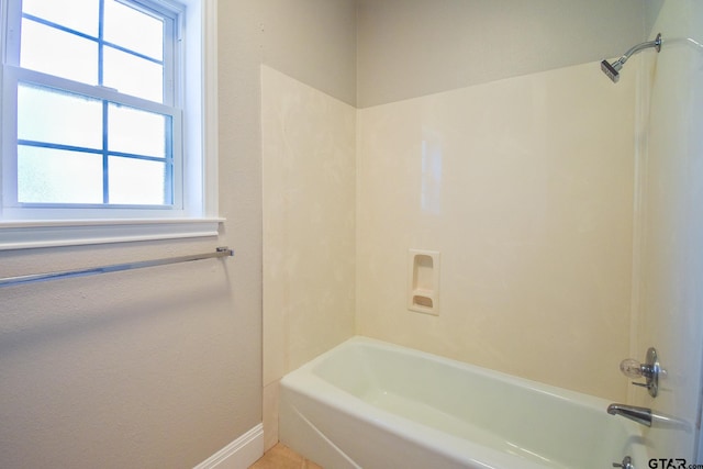 bathroom with washtub / shower combination