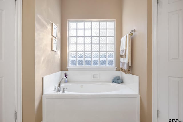 bathroom with a bath