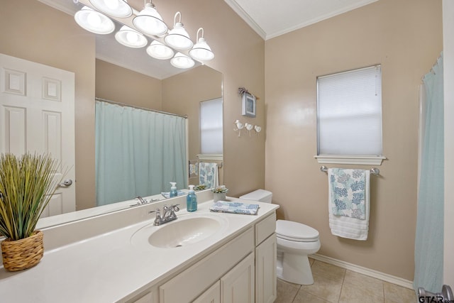 bathroom featuring tile patterned floors, vanity, toilet, and ornamental molding