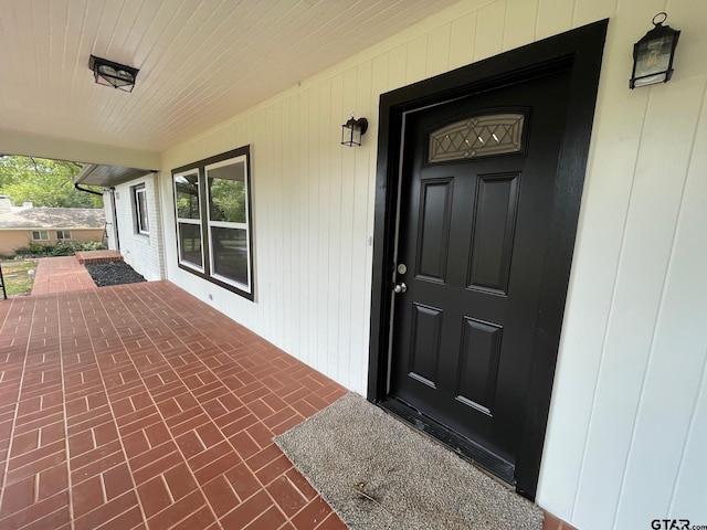 property entrance with a porch