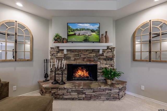 10074 Hillside Ln, Flint, TX 75762 - living area with carpet flooring, baseboards, a stone fireplace, and recessed lighting