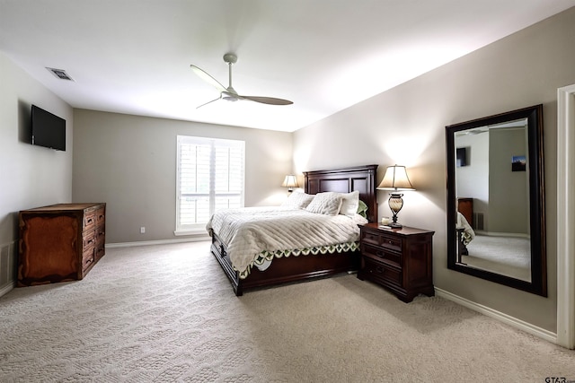 10074 Hillside Ln, Flint, TX 75762 - bedroom featuring baseboards, light carpet, and a ceiling fan