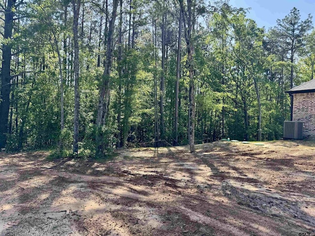 15939 Shepards Gln, Lindale, TX 75771 - view of yard featuring a view of trees