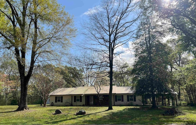 ranch-style house with a front yard