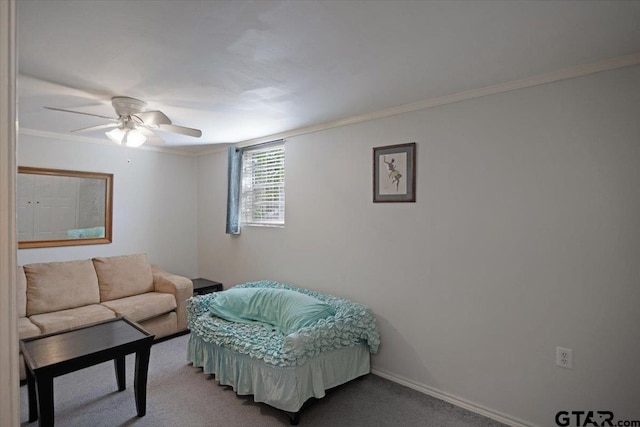 carpeted living room featuring ceiling fan and crown molding