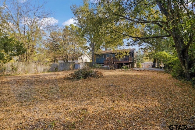 view of yard with a wooden deck