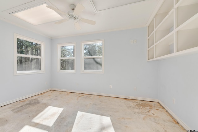 empty room with baseboards, unfinished concrete flooring, a ceiling fan, and ornamental molding