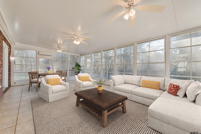 sunroom featuring a ceiling fan and a wall mounted air conditioner