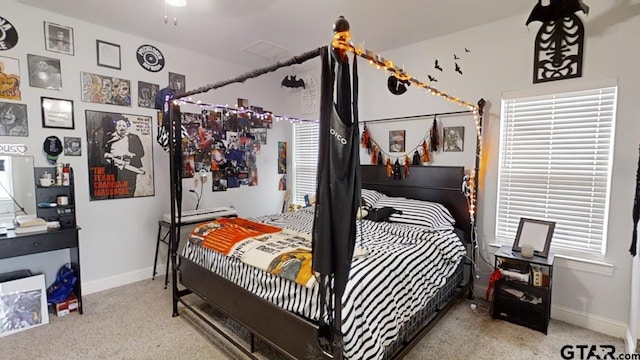 bedroom featuring baseboards