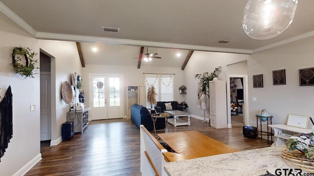 living room featuring dark wood finished floors, crown molding, visible vents, and ceiling fan
