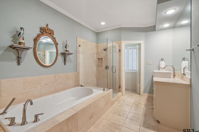 2003 Royal Oak Dr, Tyler, TX 75703 - bathroom with a bath, vanity, a stall shower, ornamental molding, and recessed lighting
