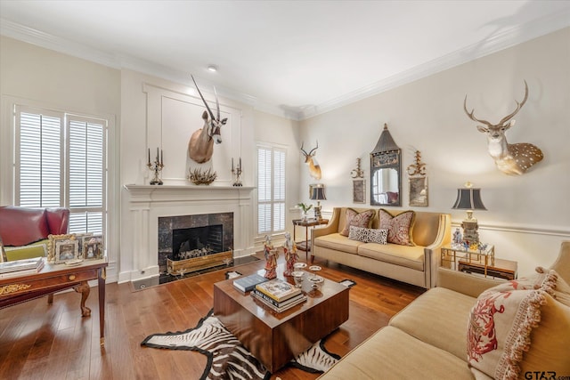 2003 Royal Oak Dr, Tyler, TX 75703 - living area featuring ornamental molding, wood-type flooring, and a fireplace