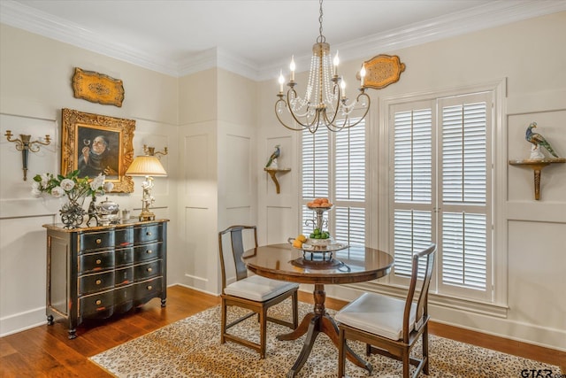 2003 Royal Oak Dr, Tyler, TX 75703 - dining room featuring a chandelier, dark wood-style floors, ornamental molding, and baseboards
