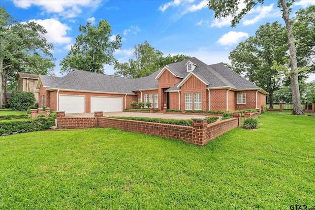 2003 Royal Oak Dr, Tyler, TX 75703 - view of front of home featuring an attached garage, concrete driveway, a front yard, and brick siding