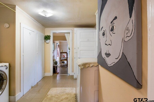 2200 N Horn Ave, Tyler, TX 75702 - laundry room with washer / dryer and light tile patterned floors