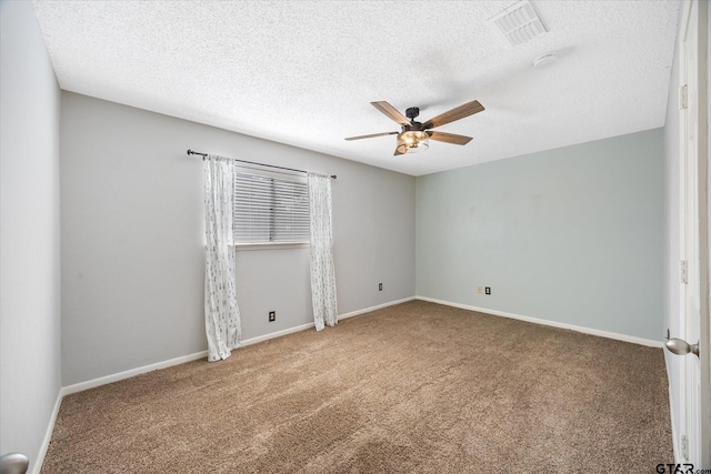 223 Guadalupe Dr, Athens, TX 75751 - carpeted empty room with ceiling fan, baseboards, and a textured ceiling