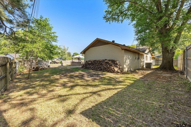 223 Guadalupe Dr, Athens, TX 75751 - view of property exterior featuring central AC and brick siding