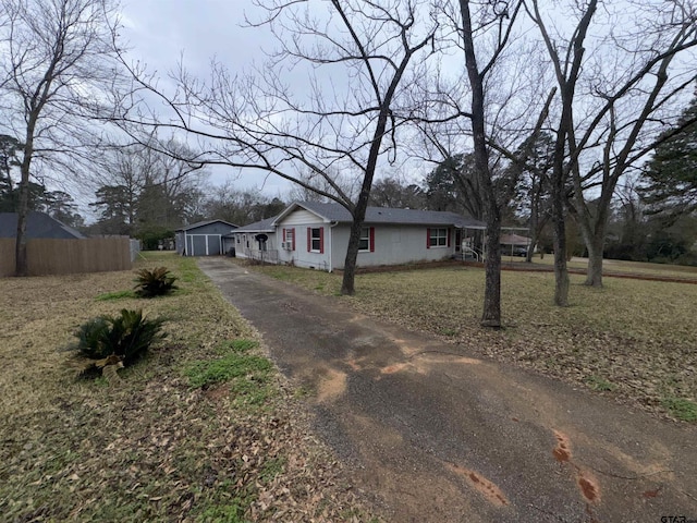 view of front of house with fence