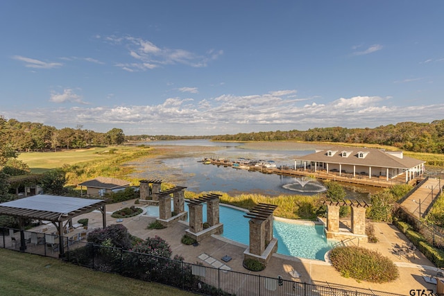 view of swimming pool featuring a patio area and a water view