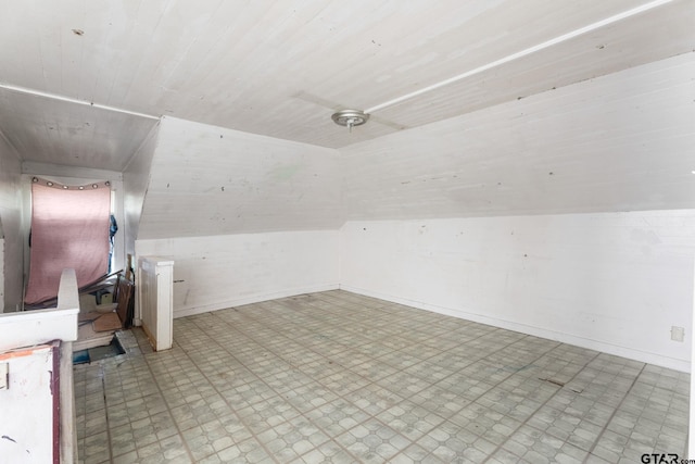 210 S Adams Ave, Tyler, TX 75702 - additional living space with vaulted ceiling, light floors, and wooden ceiling