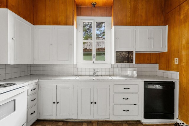 210 S Adams Ave, Tyler, TX 75702 - kitchen with a sink, light countertops, white electric stove, and black dishwasher