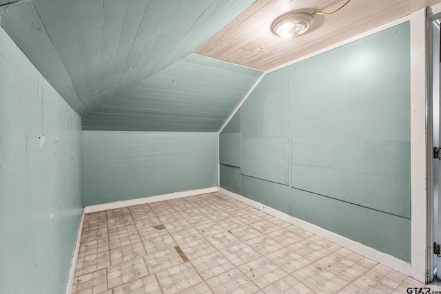 210 S Adams Ave, Tyler, TX 75702 - additional living space featuring baseboards, tile patterned floors, wooden ceiling, and vaulted ceiling