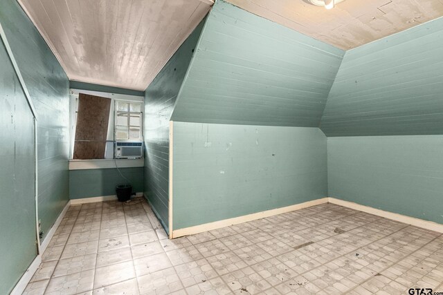 210 S Adams Ave, Tyler, TX 75702 - additional living space with baseboards, wooden ceiling, and vaulted ceiling