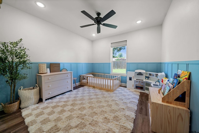 401 Deer Point Cv, Chandler, TX 75758 - bedroom with wood finished floors, recessed lighting, a wainscoted wall, a nursery area, and ceiling fan