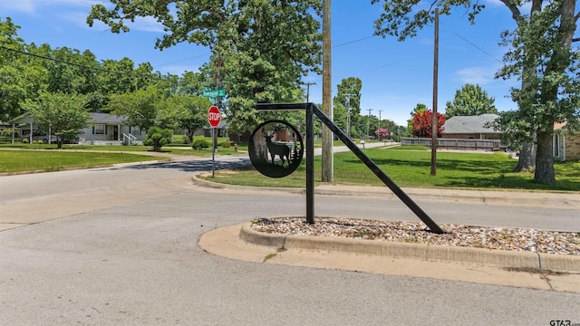 401 Deer Point Cv, Chandler, TX 75758 - view of community with a yard