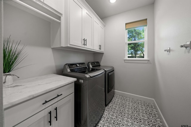401 Deer Point Cv, Chandler, TX 75758 - laundry room featuring washer and clothes dryer, cabinet space, and recessed lighting