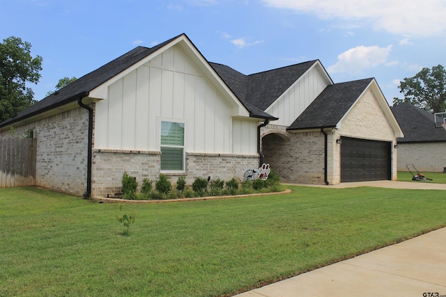 805 Jack Brown, Whitehouse, TX 75791 - view of front of house featuring board and batten siding, a garage, concrete driveway, and roof with shingles