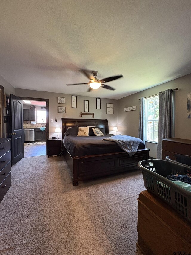 9394 Grape Ave, Frankston, TX 75763 - bedroom featuring carpet, ceiling fan, and a textured ceiling
