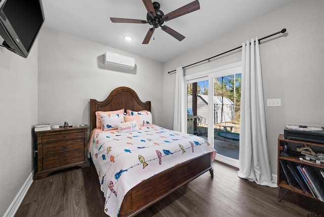 bedroom with ceiling fan, dark hardwood / wood-style flooring, a wall unit AC, and access to outside