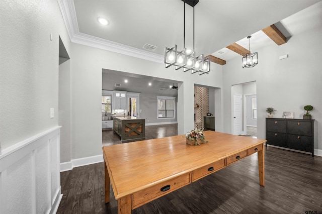 dining room with beamed ceiling, ceiling fan, ornamental molding, and dark wood-type flooring