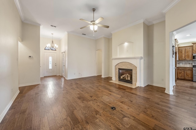 622 Martin, Chandler, TX 75758 - unfurnished living room with a ceiling fan, dark wood-style floors, a high end fireplace, crown molding, and a chandelier