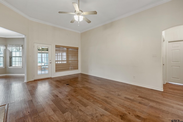 622 Martin, Chandler, TX 75758 - unfurnished room featuring ceiling fan, wood finished floors, ornamental molding, and baseboards