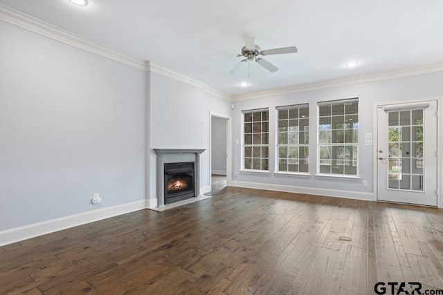 unfurnished living room featuring hardwood / wood-style flooring, a fireplace with flush hearth, and ornamental molding