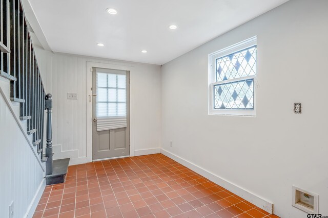 704 W 3rd St, Tyler, TX 75701 - doorway to outside featuring plenty of natural light, stairway, recessed lighting, and baseboards