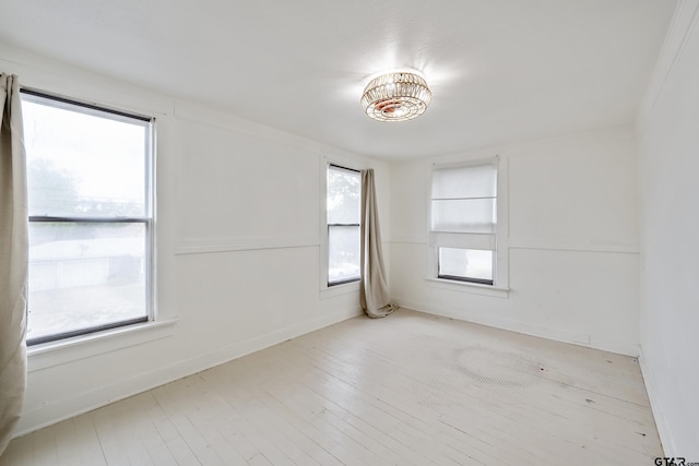 704 W 3rd St, Tyler, TX 75701 - unfurnished room with wood finished floors and baseboards