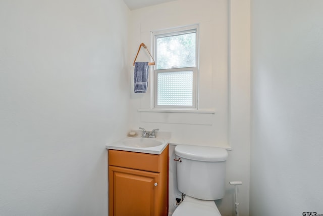 704 W 3rd St, Tyler, TX 75701 - bathroom featuring vanity and toilet