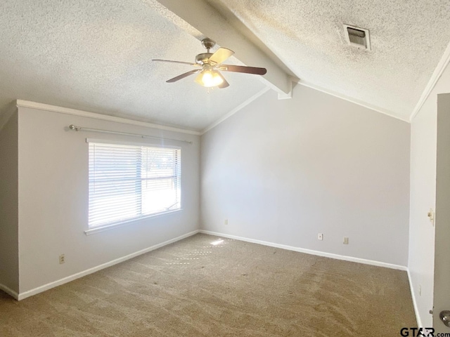 empty room featuring vaulted ceiling with beams, carpet floors, visible vents, and baseboards