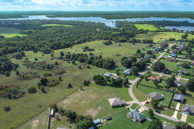 bird's eye view featuring a water view and a rural view