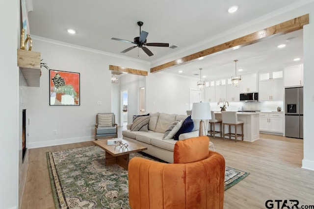 7201 Rolling Acres, Tyler, TX 75707 - living area with ornamental molding, light wood-style flooring, recessed lighting, a ceiling fan, and beamed ceiling