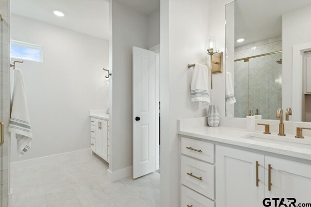 7201 Rolling Acres, Tyler, TX 75707 - full bathroom with vanity, a shower stall, recessed lighting, and baseboards