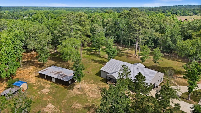 1490 Fm 13 E, Troup, TX 75789 - view of subject property featuring a heavily wooded area