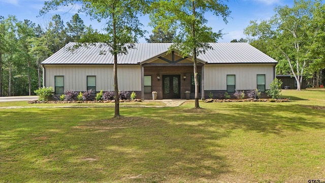 1490 Fm 13 E, Troup, TX 75789 - view of front of house with a front yard and metal roof