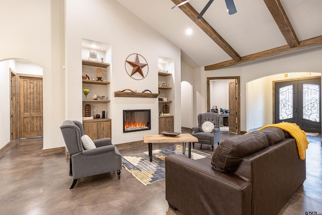 1490 Fm 13 E, Troup, TX 75789 - living area featuring built in features, arched walkways, high vaulted ceiling, baseboards, and french doors