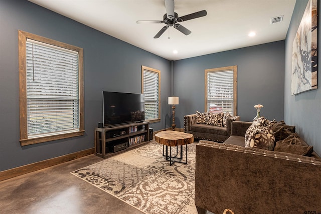 1490 Fm 13 E, Troup, TX 75789 - living area with concrete flooring, ceiling fan, baseboards, and recessed lighting