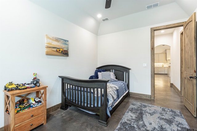 1490 Fm 13 E, Troup, TX 75789 - bedroom featuring arched walkways, vaulted ceiling, baseboards, concrete flooring, and recessed lighting